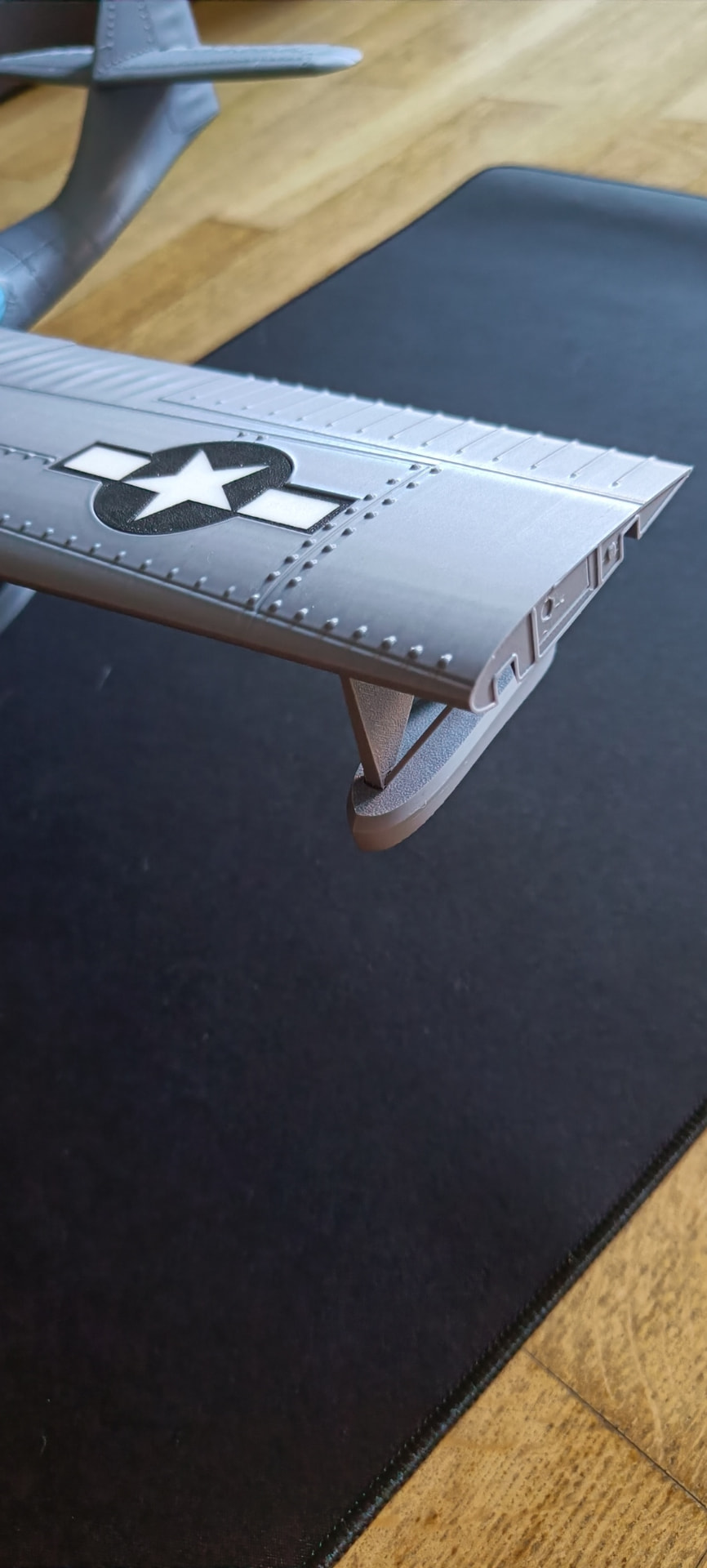 Flotador plegable e insignia US Navy en relieve.